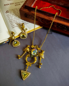 Thea's Golden Toned Parrot Motif Necklace Set