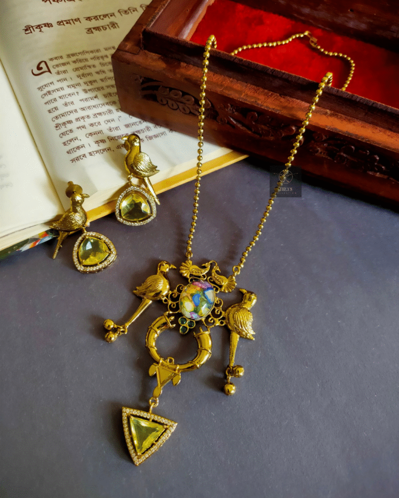Thea's Golden Toned Parrot Motif Necklace Set