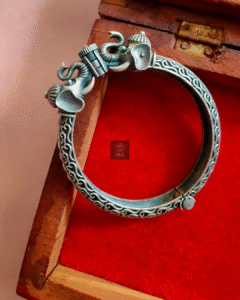Thea's Silver Look-Alike Elephant Faced Statement Screw Bangle