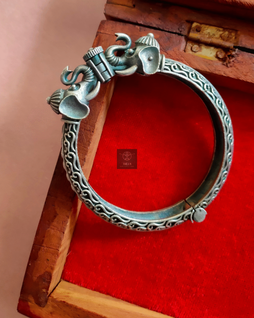 Thea's Silver Look-Alike Elephant Faced Statement Screw Bangle
