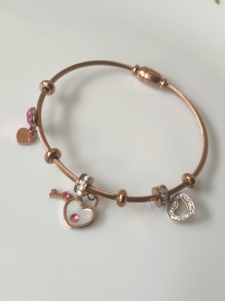 Thea's Rose Gold Charm Bracelet with Hearts & Crystals