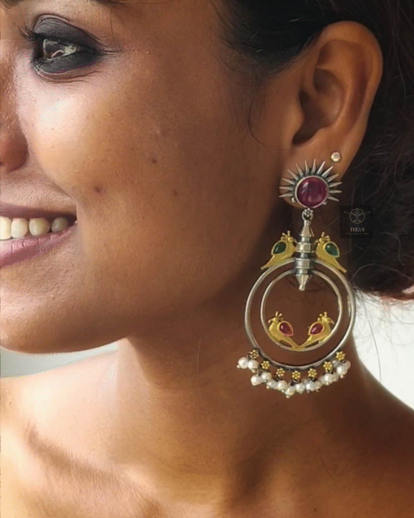 Thea's Sunburst Dual-Tone Peacock Charm Earrings