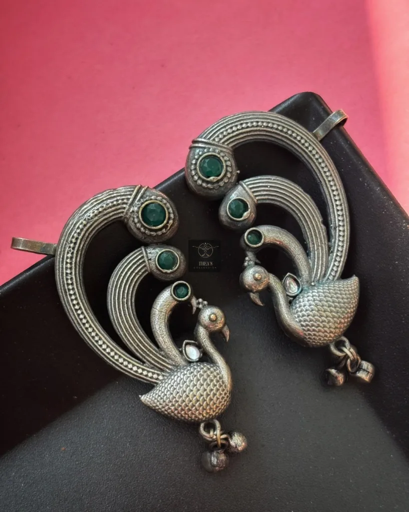Thea's Silver Looklike Peacock Motif Earcuff