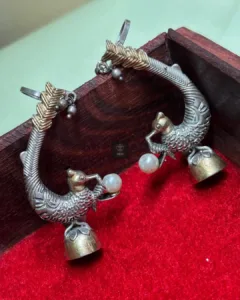 Thea's Peacock Shaped Dual Tone Earcuffs